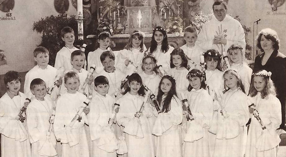 21 Kinder feiern Kommunion